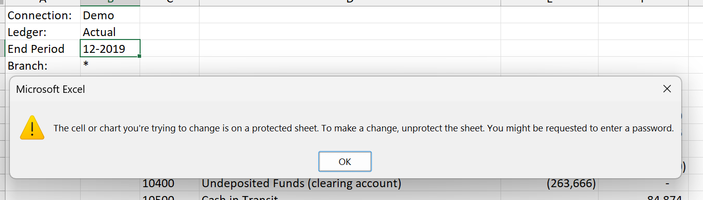 Protected Velixo report worksheet with parameter cells locked and showing an error when a user tries to edit them